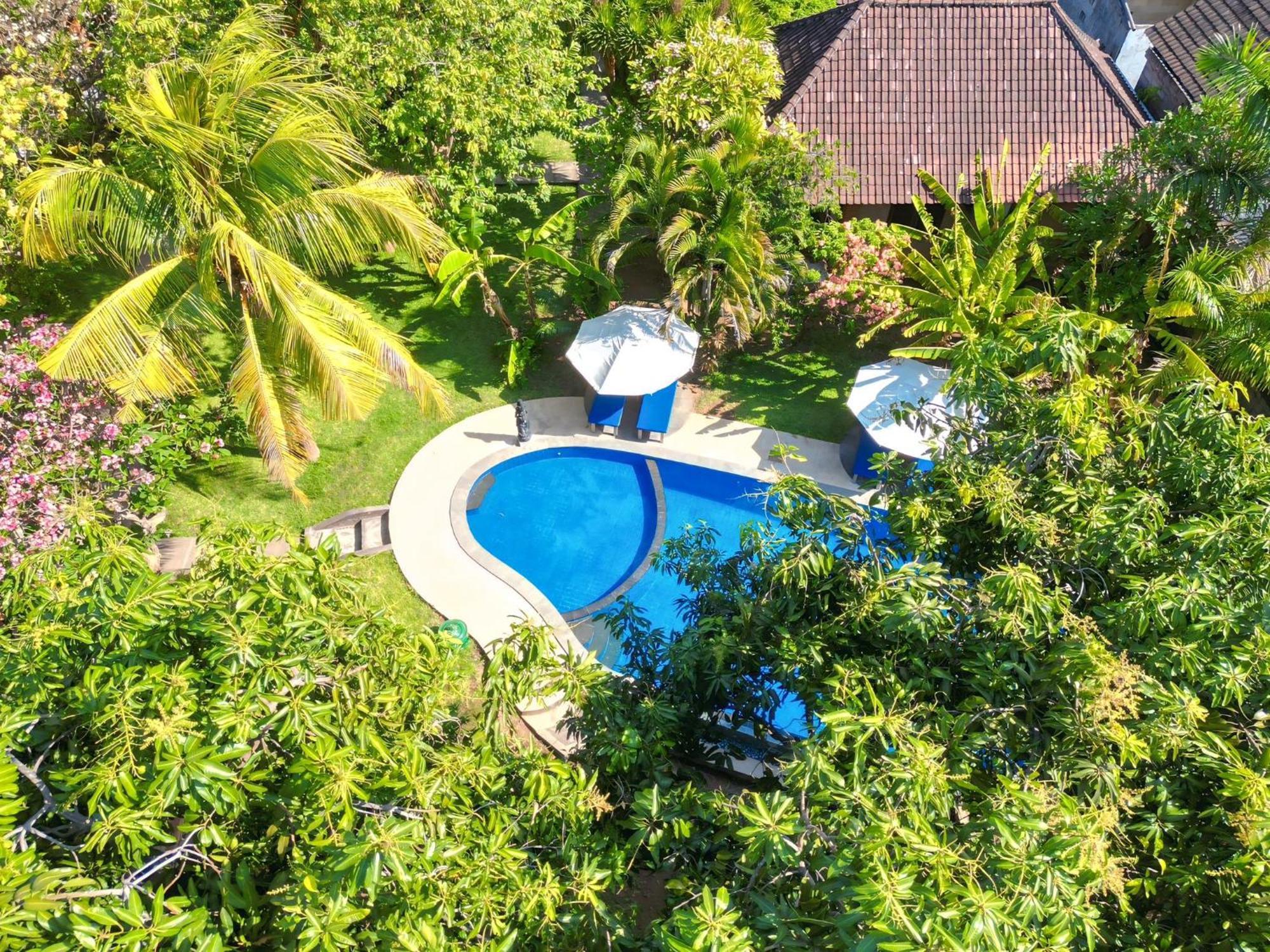 Suka Sari Cottages เปมูเตรัน ภายนอก รูปภาพ